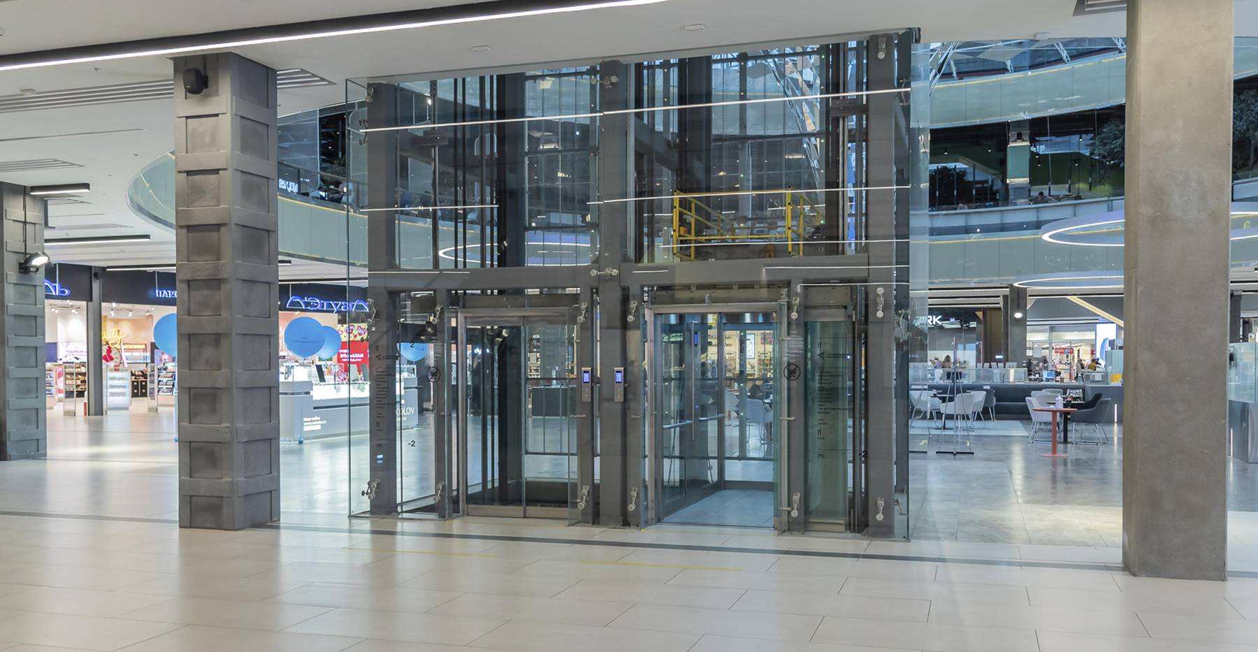 Фото проекта: Остекление атриума и лифтовых шахт в ТРЦ Европолис. Изображение № 9